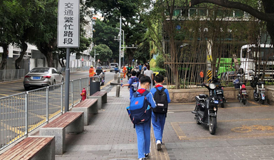 Children leave a school in Shekou area of Shenzhen
